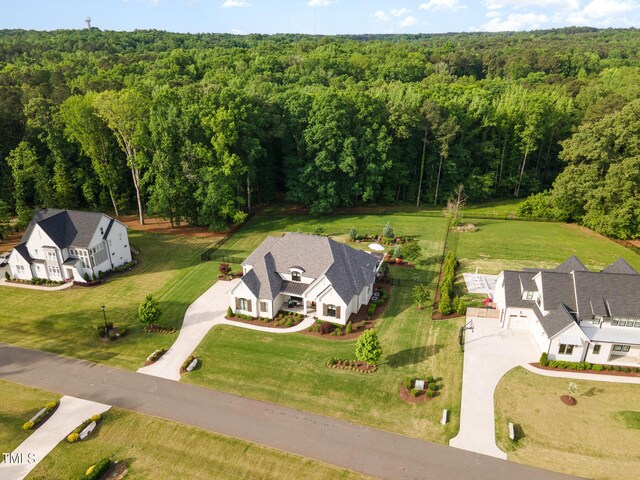 drone / aerial view with a forest view