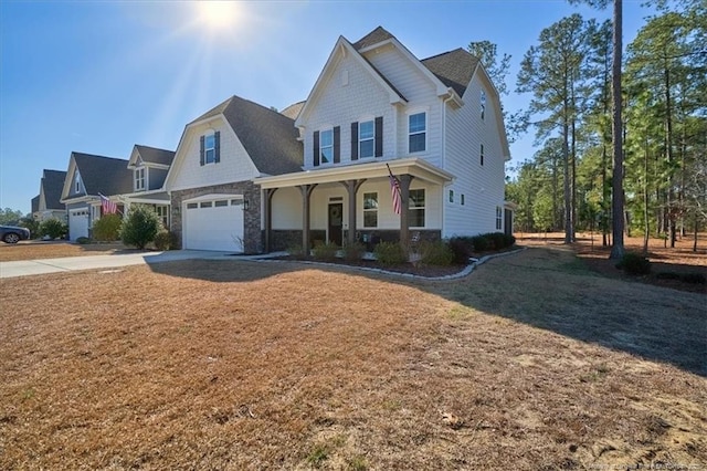 view of front of property featuring covered porch and a front yard