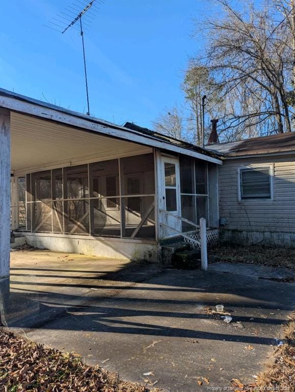 exterior space with a sunroom