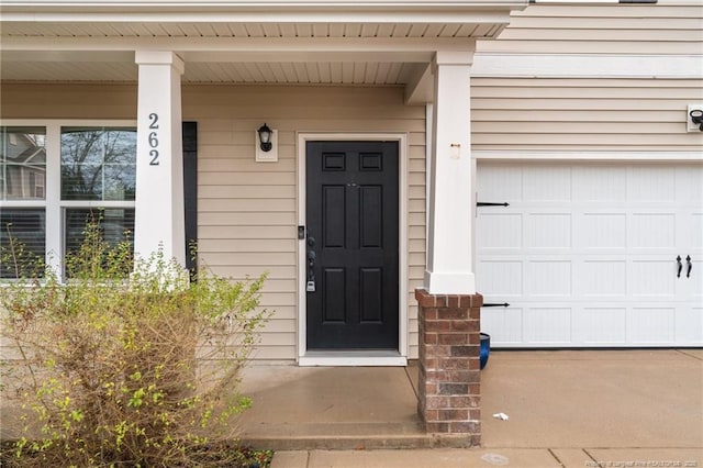 property entrance featuring a garage