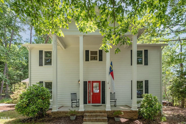 neoclassical home with covered porch