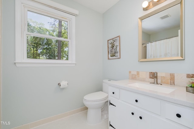 full bathroom with visible vents, baseboards, tile patterned floors, vanity, and toilet