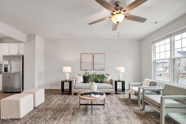 living room with ceiling fan