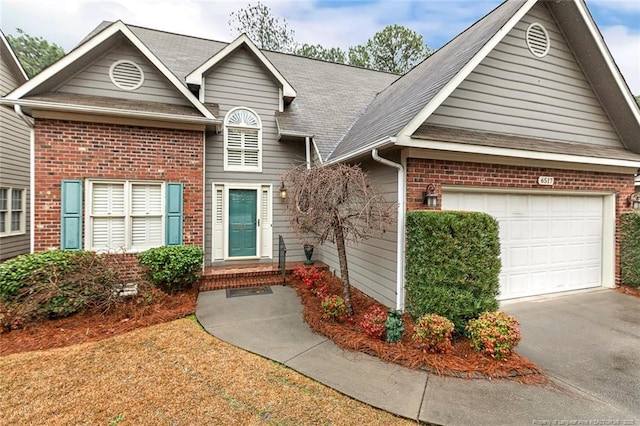 view of front of property with a garage