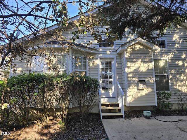 exterior space featuring entry steps and a patio