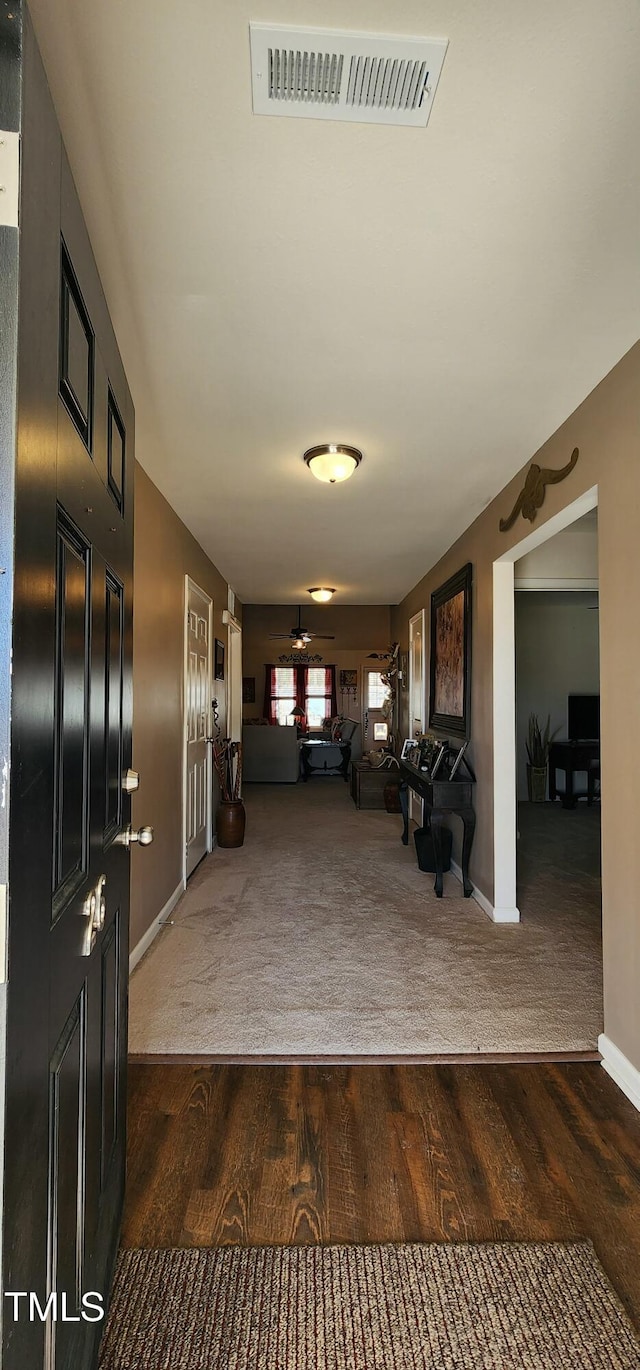 interior space with dark hardwood / wood-style floors