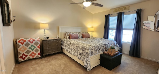 carpeted bedroom featuring ceiling fan and vaulted ceiling