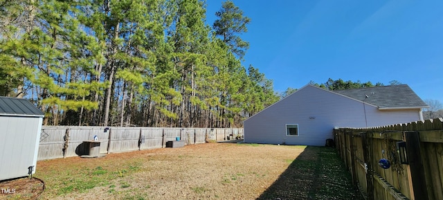 view of yard with central AC