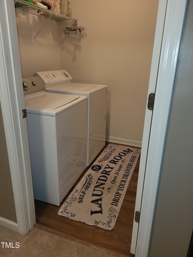 laundry room featuring washing machine and clothes dryer