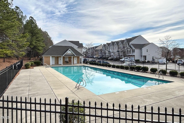 104 Mainline Station Dr, Durham, NC 27560 - community pool with a residential view and a patio area