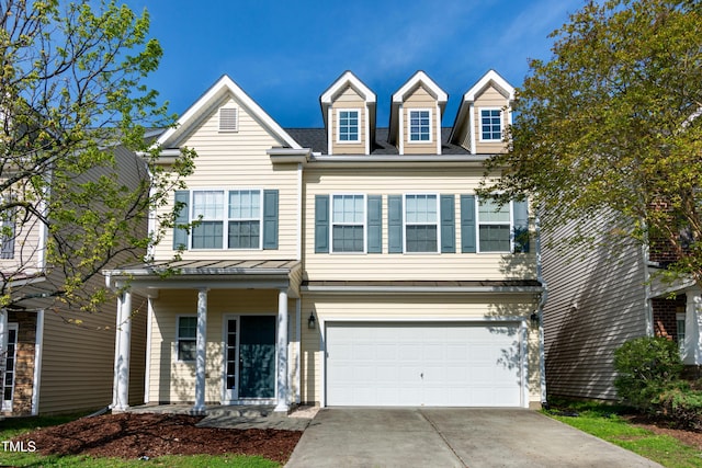 104 Mainline Station Dr, Durham, NC 27560 - view of front of property with an attached garage, driveway, and a porch