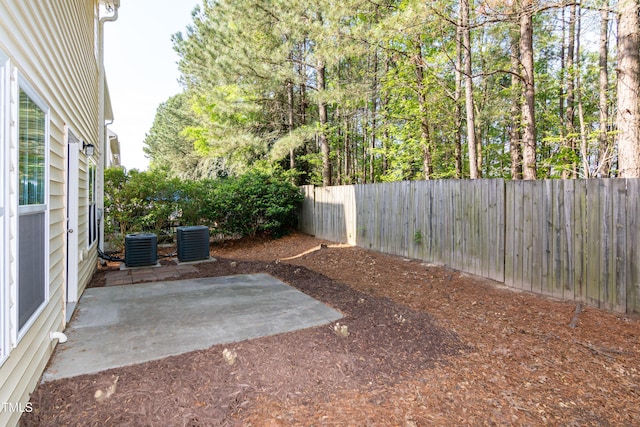 104 Mainline Station Dr, Durham, NC 27560 - fenced backyard with a patio