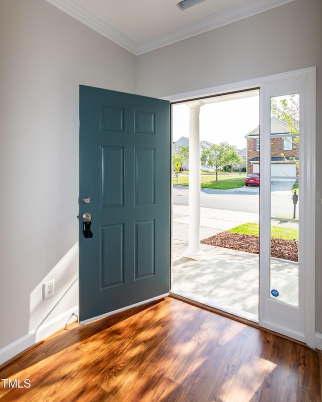 104 Mainline Station Dr, Durham, NC 27560 - foyer entrance with ornate columns, wood finished floors, and ornamental molding