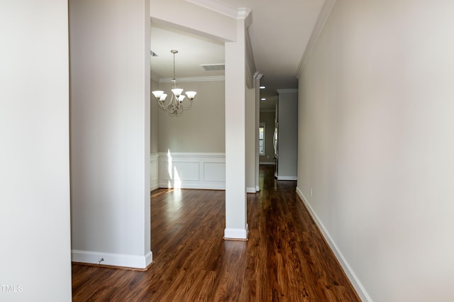 104 Mainline Station Dr, Durham, NC 27560 - hall with ornamental molding, dark wood-type flooring, and a chandelier