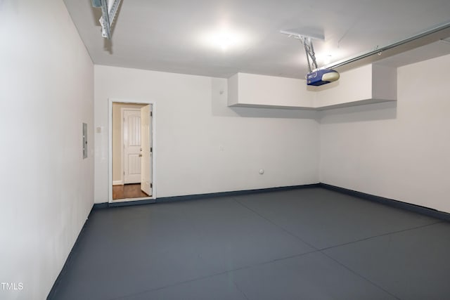 104 Mainline Station Dr, Durham, NC 27560 - garage with a garage door opener and baseboards