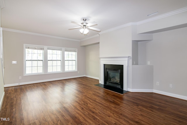 104 Mainline Station Dr, Durham, NC 27560 - unfurnished living room with ceiling fan, crown molding, dark wood finished floors, and a glass covered fireplace