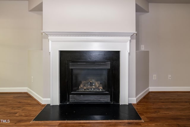 104 Mainline Station Dr, Durham, NC 27560 - detailed view of a fireplace and wood finished floors