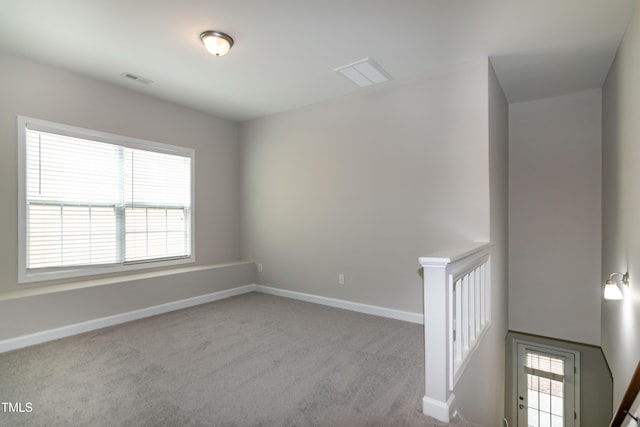 104 Mainline Station Dr, Durham, NC 27560 - spare room with carpet floors and healthy amount of natural light