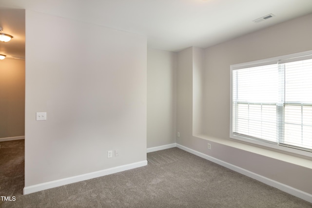 104 Mainline Station Dr, Durham, NC 27560 - carpeted empty room with baseboards