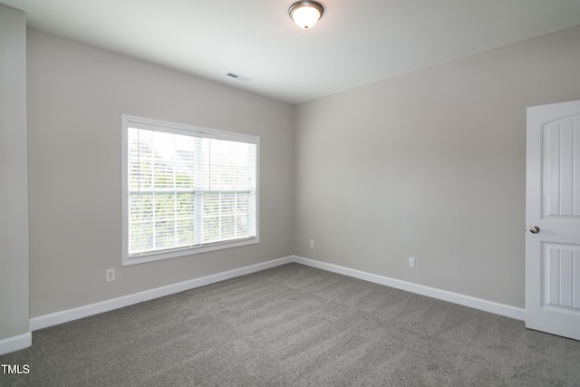 104 Mainline Station Dr, Durham, NC 27560 - carpeted empty room featuring baseboards