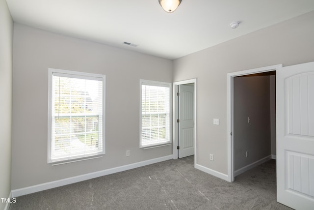 104 Mainline Station Dr, Durham, NC 27560 - unfurnished bedroom with baseboards and carpet flooring