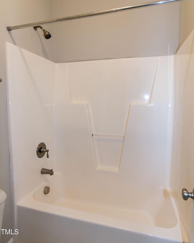 104 Mainline Station Dr, Durham, NC 27560 - bathroom featuring washtub / shower combination and toilet
