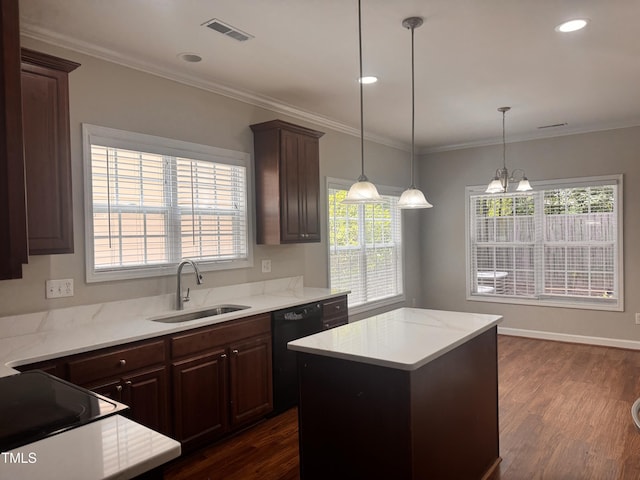 104 Mainline Station Dr, Durham, NC 27560 - kitchen featuring black dishwasher, dark wood finished floors, a center island, dark brown cabinets, and crown molding