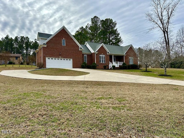 view of front of property with driveway, a front yard, and brick siding