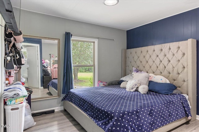 bedroom featuring light wood-type flooring