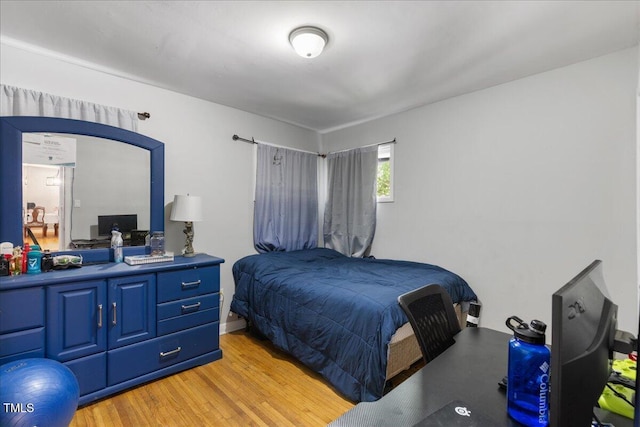 bedroom featuring light hardwood / wood-style flooring