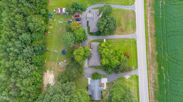 birds eye view of property with a rural view