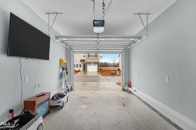 garage featuring a garage door opener