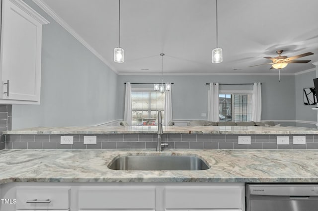 kitchen with dishwasher, light stone countertops, sink, and white cabinets