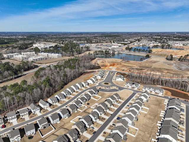 aerial view featuring a residential view and a water view