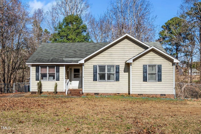 single story home featuring a front lawn