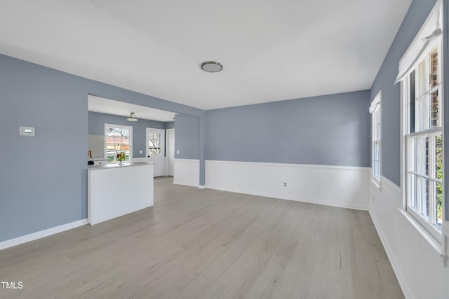 98 S Denise Ave, Coats, NC 27521 - unfurnished living room with light hardwood / wood-style flooring