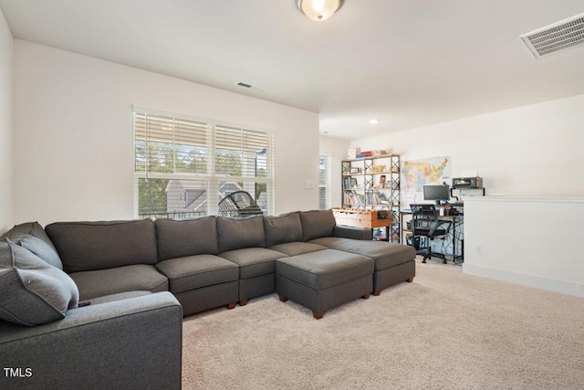 220 Green Haven Blvd, Youngsville, NC 27596 - living room with light colored carpet, visible vents, and baseboards