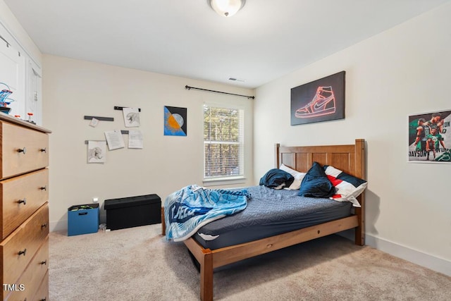 220 Green Haven Blvd, Youngsville, NC 27596 - carpeted bedroom featuring baseboards