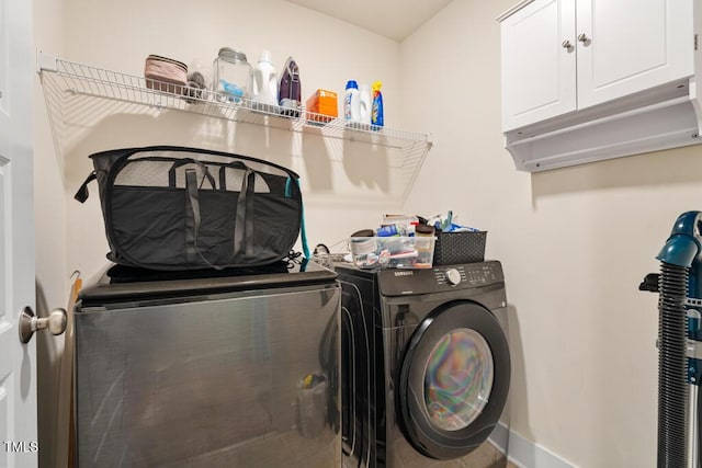 220 Green Haven Blvd, Youngsville, NC 27596 - clothes washing area with washer and clothes dryer and cabinet space
