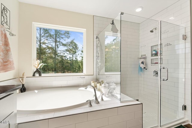 220 Green Haven Blvd, Youngsville, NC 27596 - bathroom with a garden tub, recessed lighting, and a shower stall