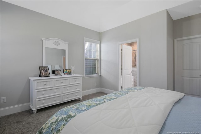 bedroom featuring dark carpet