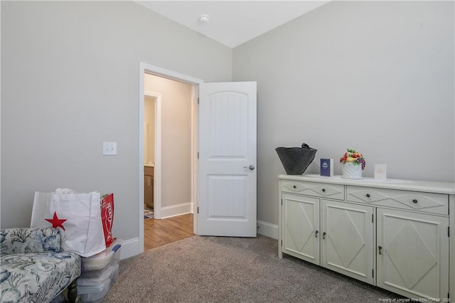 interior space featuring light carpet