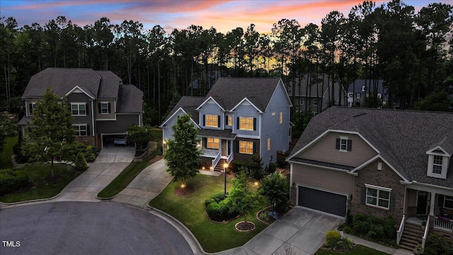 208 Cecelia Ct, Cary, NC 27519 - view of front facade featuring driveway and brick siding