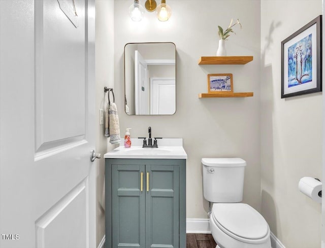 208 Cecelia Ct, Cary, NC 27519 - half bath with toilet, vanity, baseboards, and wood finished floors