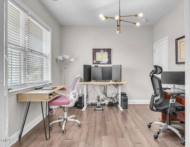 208 Cecelia Ct, Cary, NC 27519 - office with a chandelier, wood finished floors, and baseboards