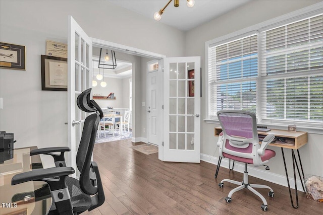 208 Cecelia Ct, Cary, NC 27519 - home office featuring french doors, wood finished floors, and baseboards