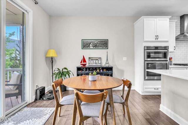 208 Cecelia Ct, Cary, NC 27519 - dining area with wood finished floors and baseboards