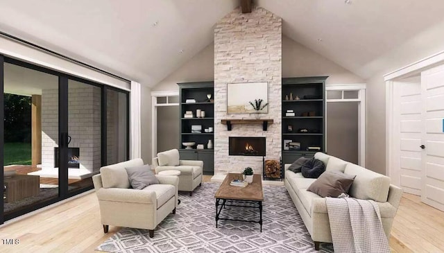living room with hardwood / wood-style flooring, high vaulted ceiling, a fireplace, and beam ceiling