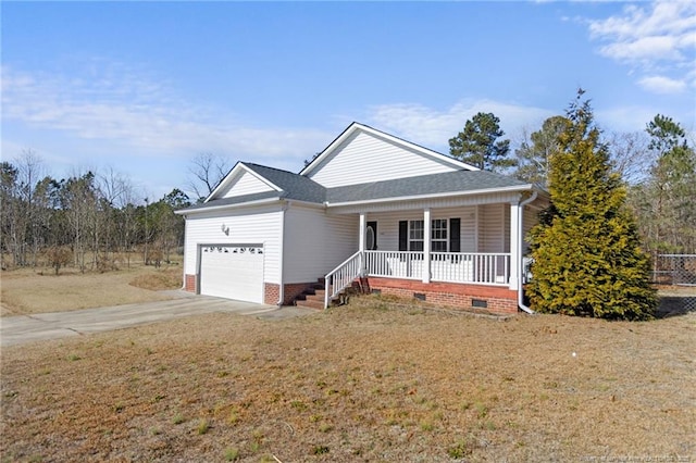 view of front of house featuring a garage, a front yard, and covered porch