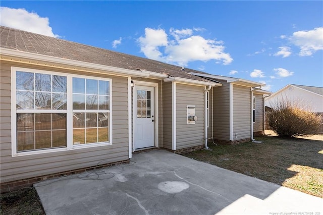 rear view of house with a patio area